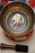 Load image into Gallery viewer, Close-up of Singing Bowl interior showing Green Tara artwork, Tibetan mantra engraving and chakra symbols