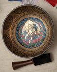 Load image into Gallery viewer, Green Tara Singing Bowl for Third Eye Chakra with inner deity artwork, mantra design and wooden mallet