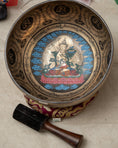 Load image into Gallery viewer, Manjushri Singing Bowl for Third Eye Chakra with inner deity artwork, Tibetan mantra design, red cushion and wooden mallet.