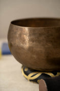 Load image into Gallery viewer, Handcrafted Kopre singing bowl supporting crown chakra alignment