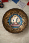 Load image into Gallery viewer, Four-Armed Chenrezig Carved Singing Bowl - Handcrafted Tibetan Bowl