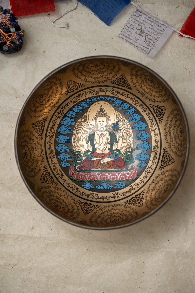 Four-Armed Chenrezig Carved Singing Bowl - Handcrafted Tibetan Bowl