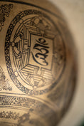 Load image into Gallery viewer, Four-Armed Chenrezig Carved Singing Bowl - Handcrafted Tibetan Bowl