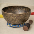 Load image into Gallery viewer, Antique style engraved Singing Bowl for Sacral Chakra with dark aged finish, blue cushion and wooden mallet