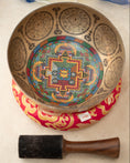 Load image into Gallery viewer, Wisdom Eye Singing Bowl with inner mandala artwork, sacred geometry symbols, red cushion and wooden mallet