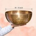 Load image into Gallery viewer, Group meditation scene with Full Moon Singing Bowl being played under moonlight.
