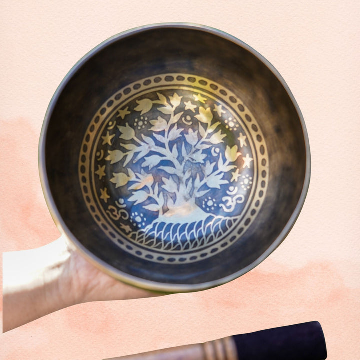 Tree of Life Singing Bowl with engraved interior artwork, aged brass finish and decorative rim border.