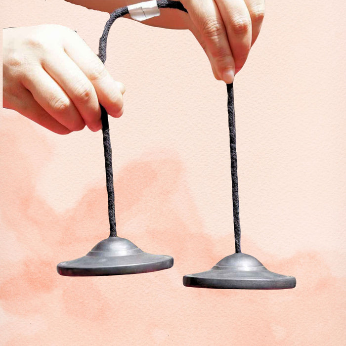 Premium Tingsha Bell with high frequency tone, black cord and modern bell-shaped cymbal design.
