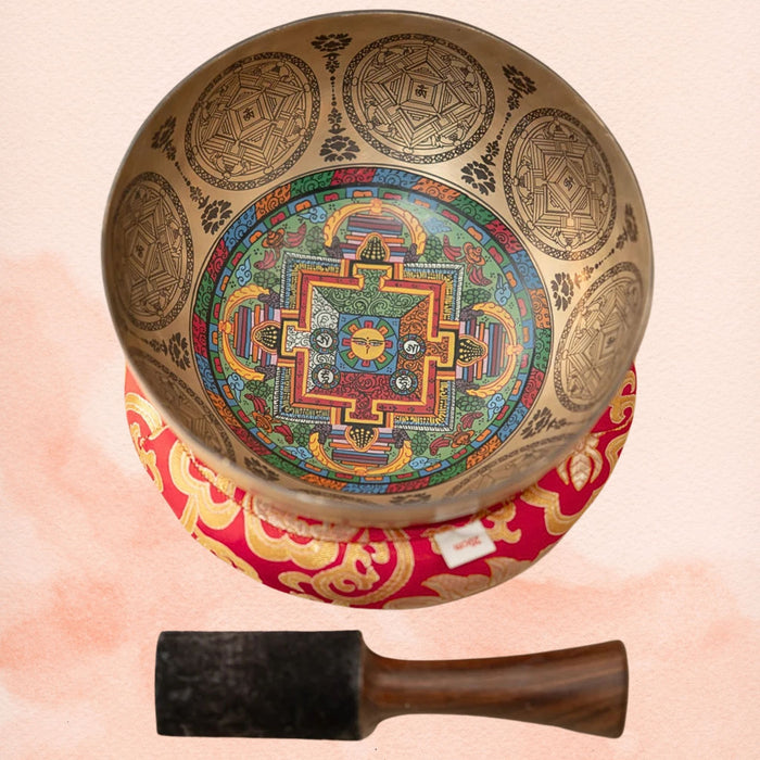 Wisdom Eye Singing Bowl with inner mandala artwork, symbolic geometry symbols, red cushion and wooden mallet.
