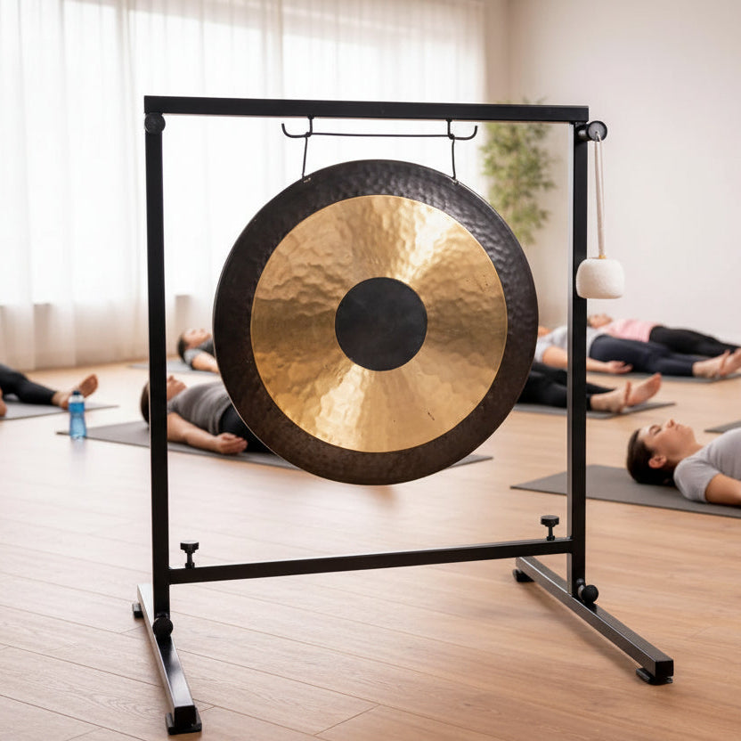 Gong on a stand in a room with wooden floor and decor