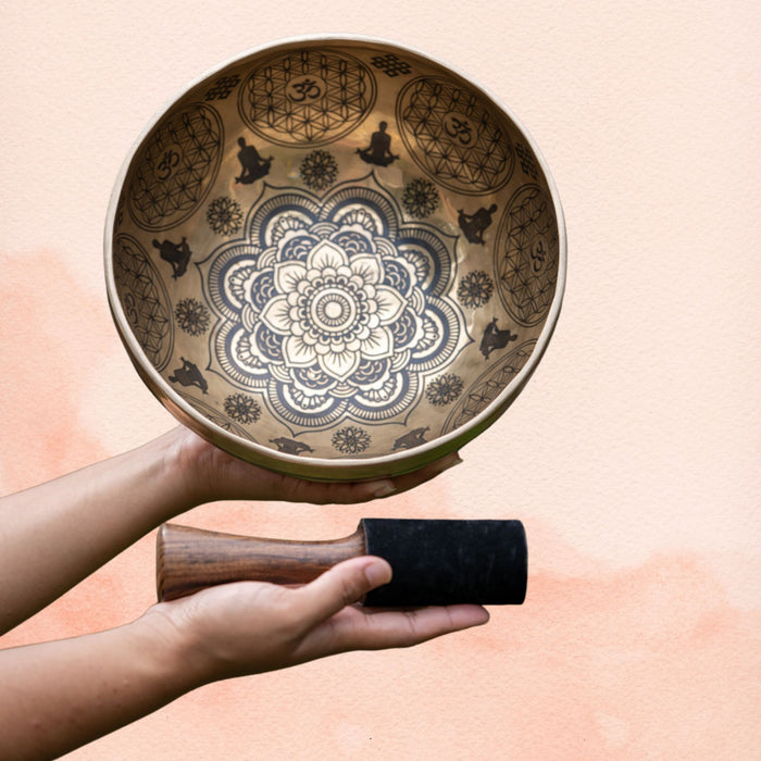 quiet listening Singing Bowl with engraved mandala design, aged brass finish and wooden mallet.