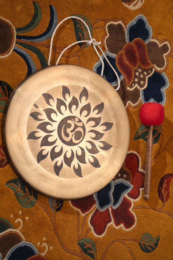 symbolic Om Gong with Flower Petal Design.