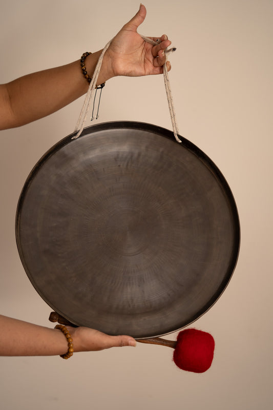 Chakra Gong with Meditating Yogi for Sound Healing.