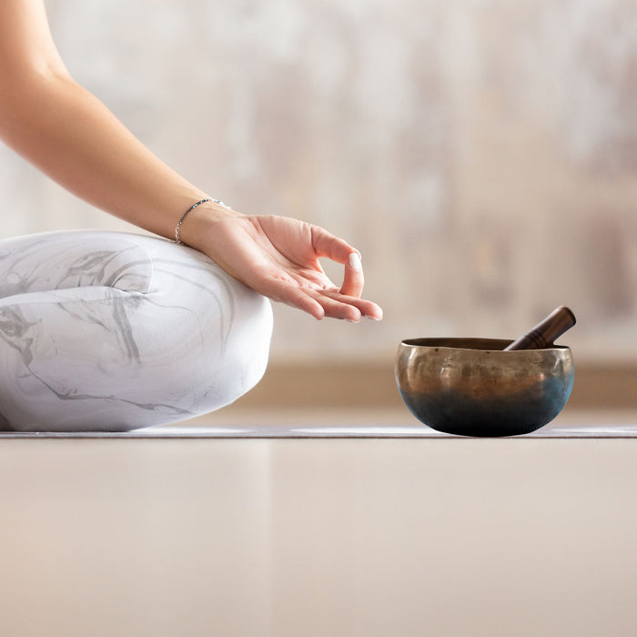 Handmade Singing Bowl shown for size and design reference.